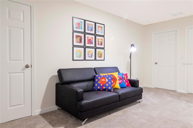 living room featuring light colored carpet