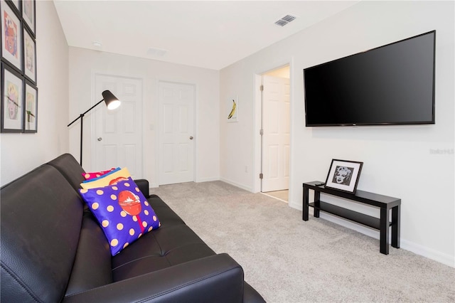 living room featuring light colored carpet