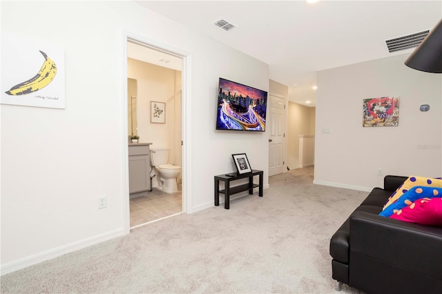 sitting room with light carpet