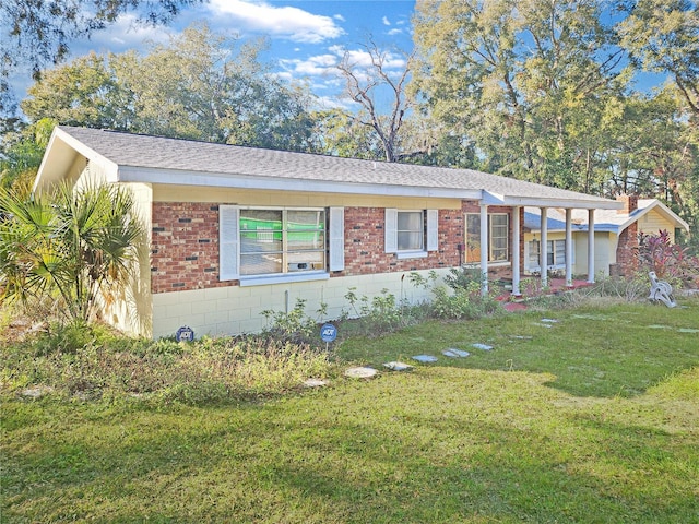 ranch-style house with a front yard