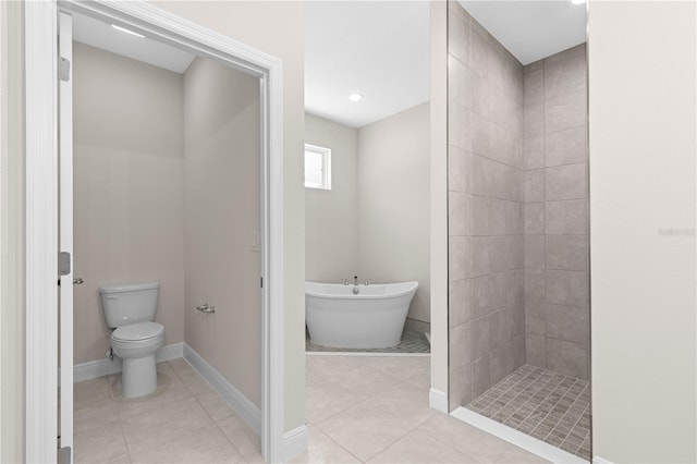 bathroom with toilet, separate shower and tub, and tile patterned flooring