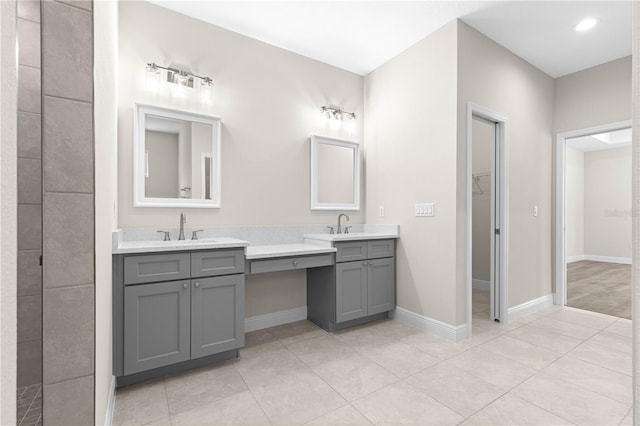 bathroom with vanity and tile patterned flooring