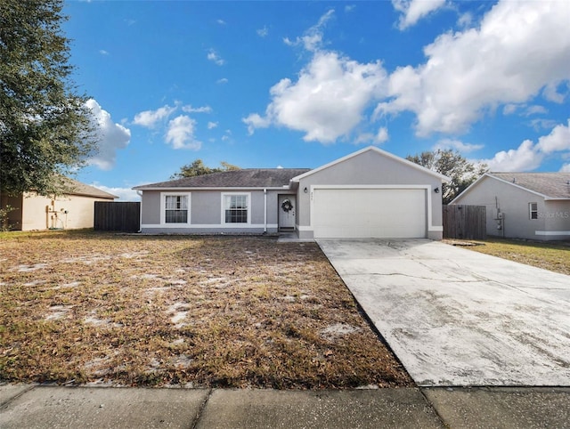 single story home with a garage