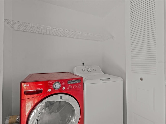 laundry area featuring separate washer and dryer