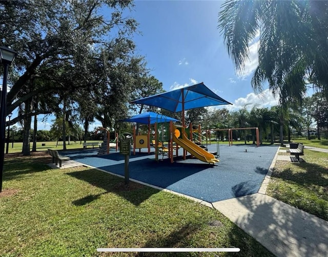 view of play area featuring a lawn