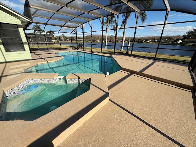 view of swimming pool featuring a lanai, a patio, and a water view