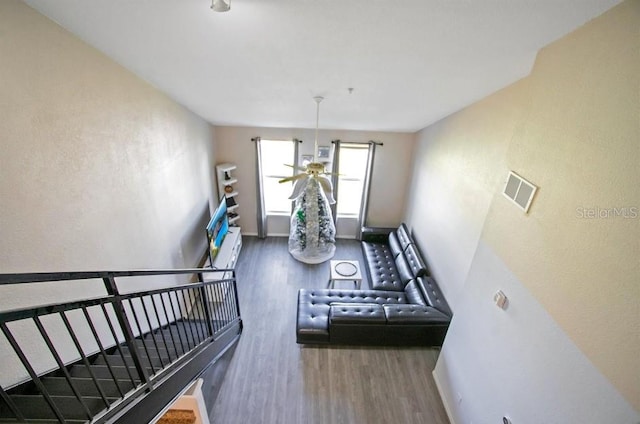 living room with dark hardwood / wood-style floors