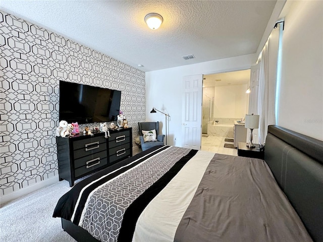 carpeted bedroom with a textured ceiling