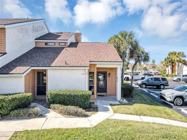 view of front of home featuring a front yard