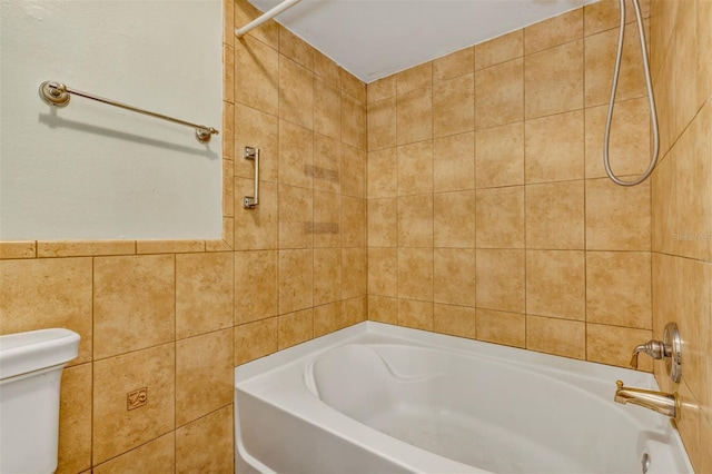 3002 Clubview Dr, Orlando, FL 32822 - full bathroom featuring toilet, tile walls, and washtub / shower combination