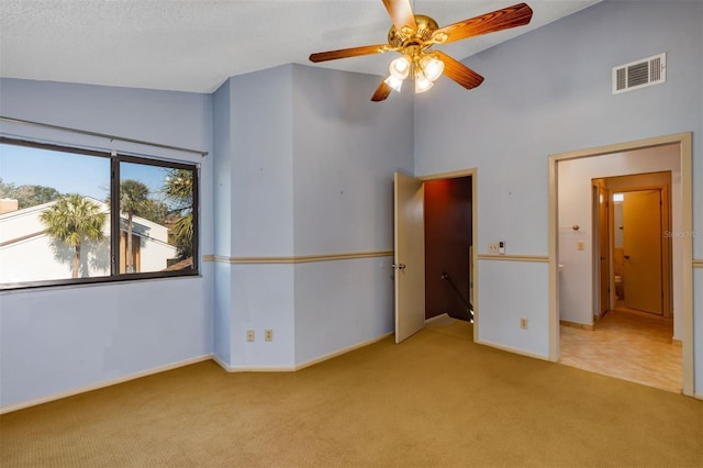 3002 Clubview Dr, Orlando, FL 32822 - unfurnished bedroom featuring carpet floors, baseboards, high vaulted ceiling, and ceiling fan