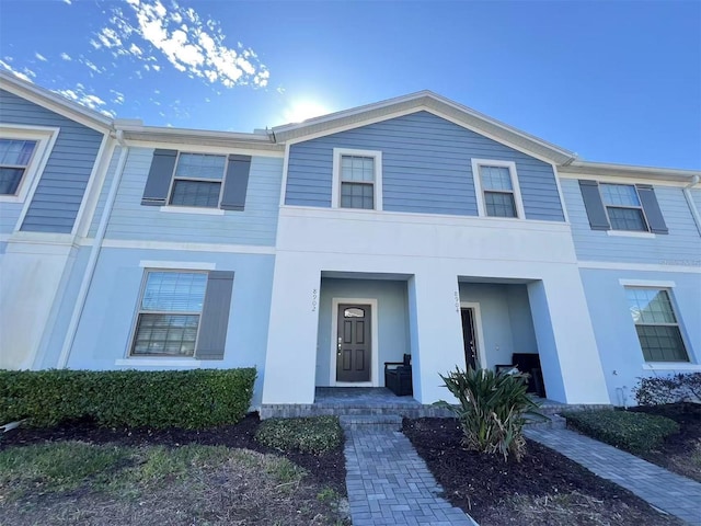 view of property with stucco siding