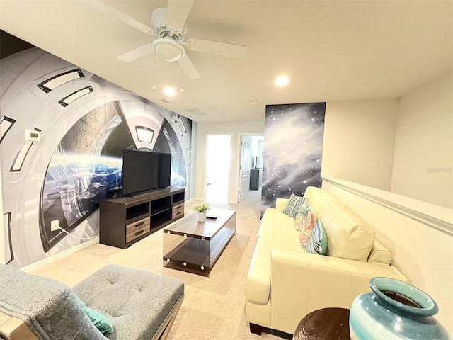 home theater featuring carpet and ceiling fan