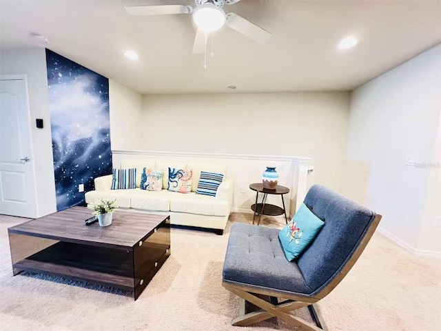 carpeted living area with recessed lighting, a ceiling fan, and baseboards