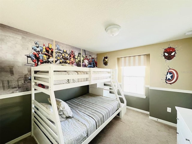 carpeted bedroom with baseboards