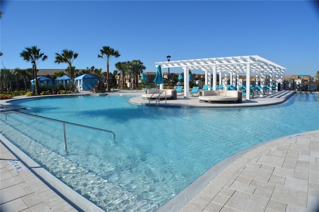 community pool featuring a patio area and a pergola