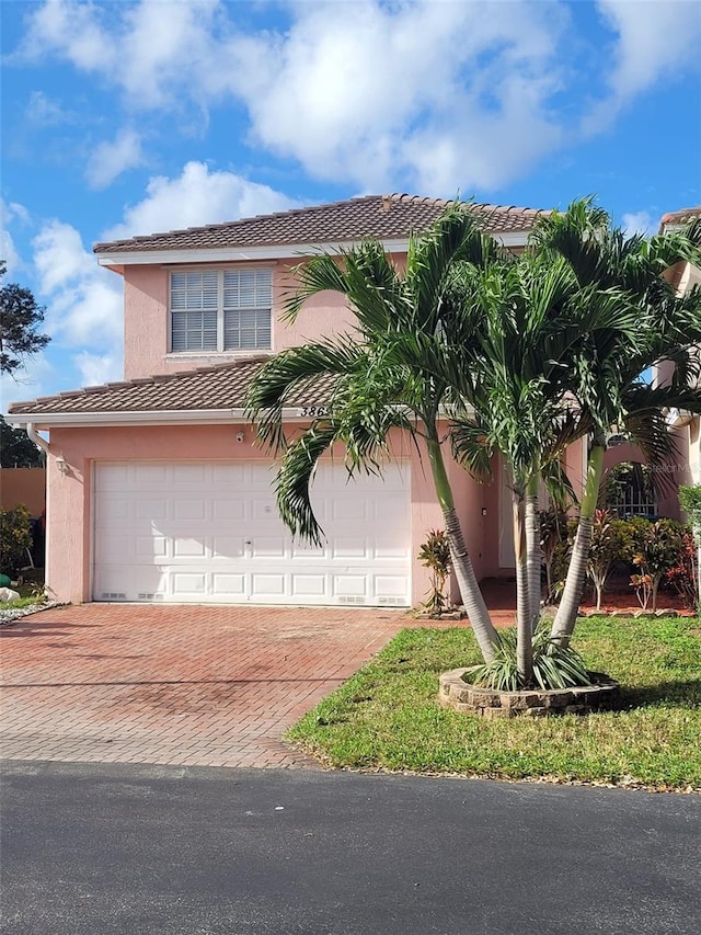 view of front of home with a garage