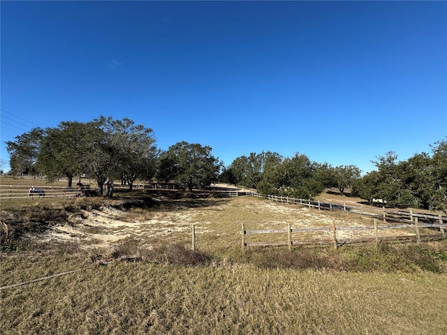 view of yard featuring a rural view