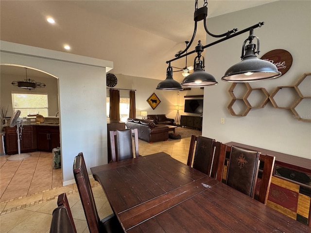 dining area with sink and light tile patterned floors