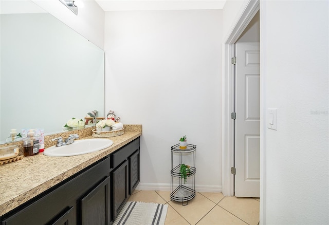 bathroom with vanity and tile patterned floors