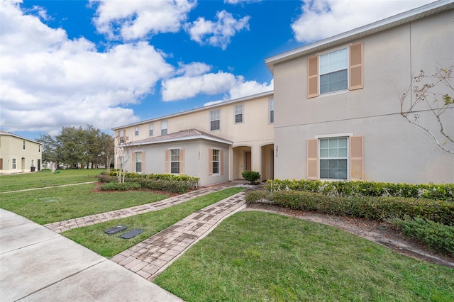 view of front of house with a front lawn