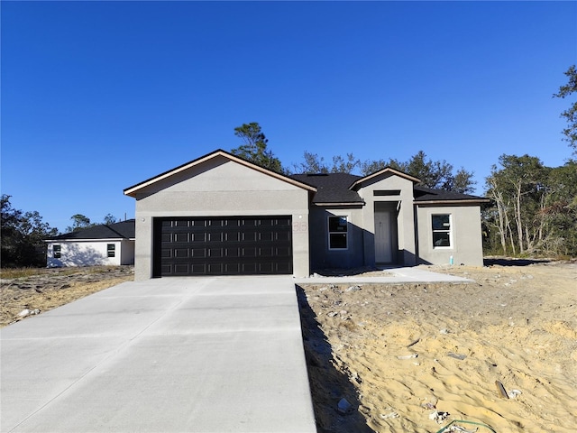 view of front of property with a garage