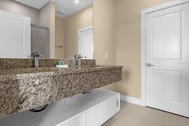 bathroom with sink and tile patterned floors