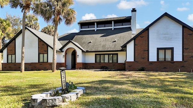 view of front of house with a front lawn