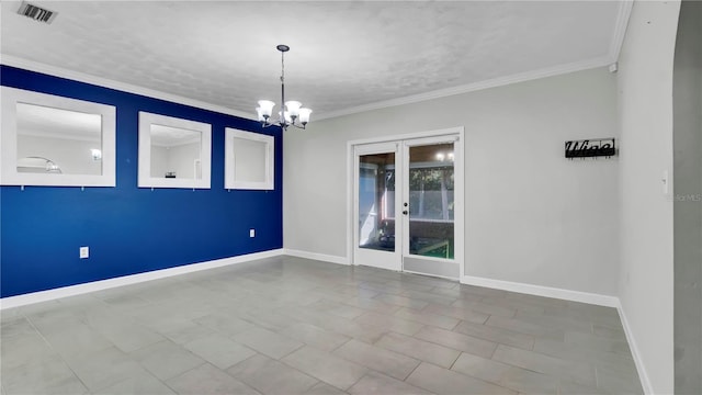 empty room with an inviting chandelier, ornamental molding, a textured ceiling, and light tile patterned flooring