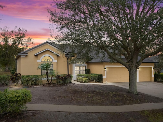 view of front of home with a garage