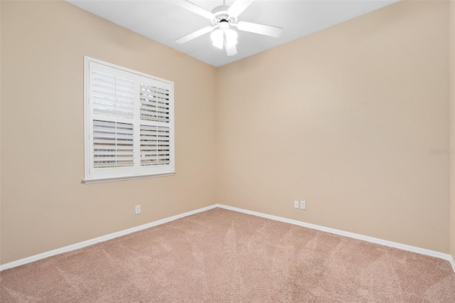 empty room with carpet floors and ceiling fan