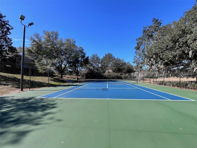 view of sport court featuring basketball court