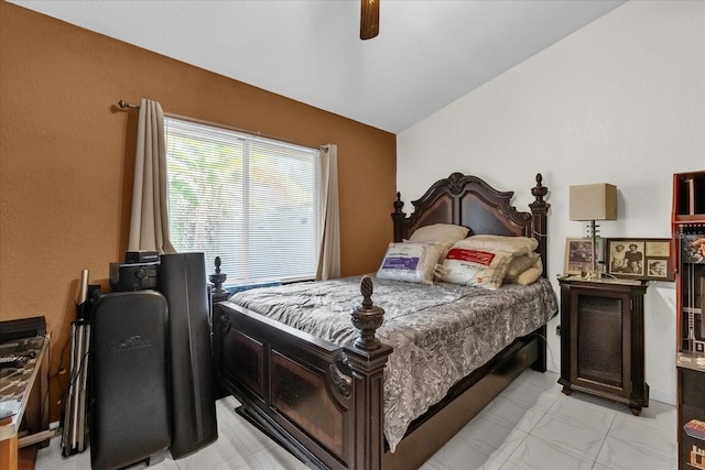 bedroom with vaulted ceiling and ceiling fan