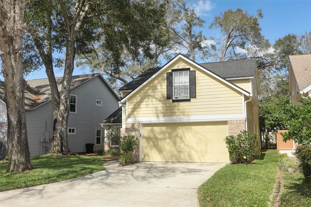 front facade with a garage and a front lawn