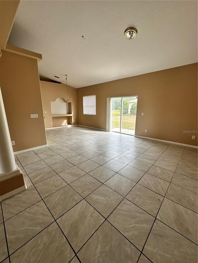 interior space featuring a textured ceiling