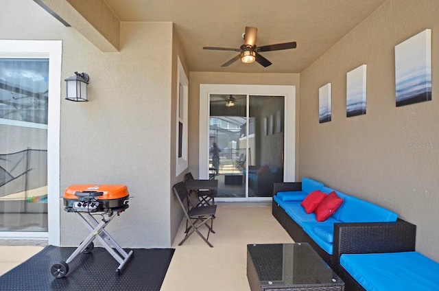 view of patio featuring ceiling fan