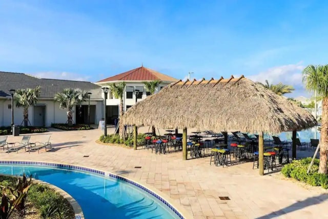 view of pool featuring a gazebo and a patio area