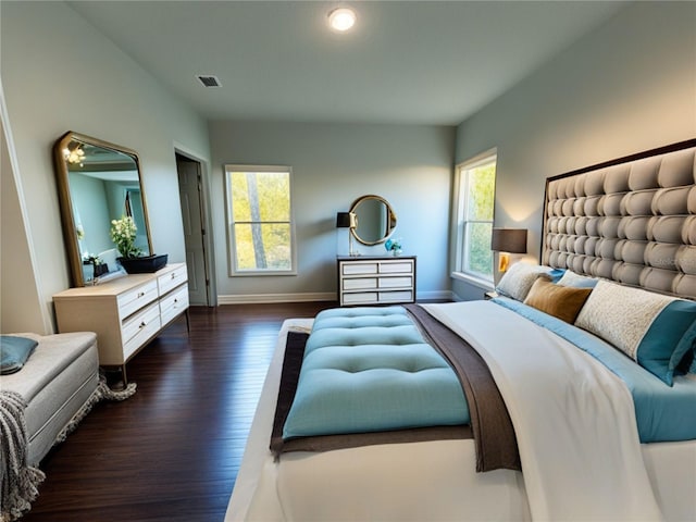 bedroom featuring dark hardwood / wood-style floors