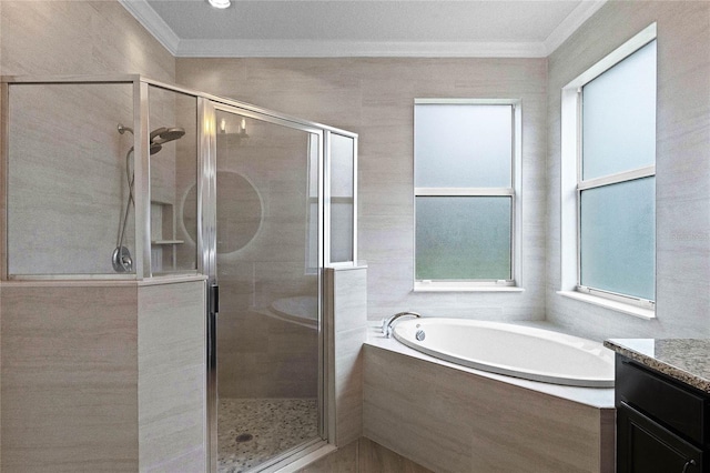 bathroom with vanity, ornamental molding, and independent shower and bath