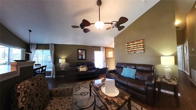 living room featuring hardwood / wood-style floors, high vaulted ceiling, and ceiling fan