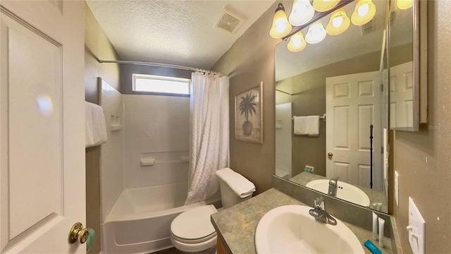 full bathroom featuring vanity, toilet, a textured ceiling, and shower / bath combo with shower curtain