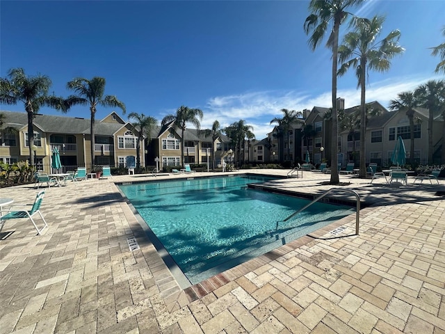 view of swimming pool featuring a patio area