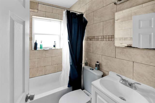 full bathroom featuring tile walls, vanity, toilet, and shower / bathtub combination with curtain