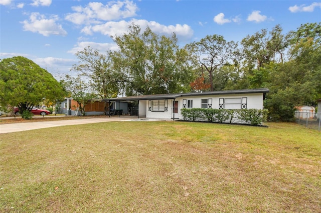 single story home with a carport and a front yard