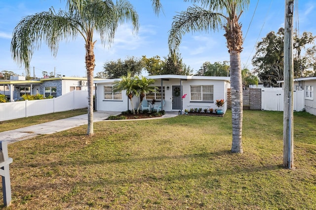 view of front of home with a front lawn