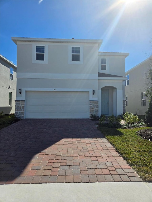 front facade with a garage