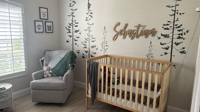 bedroom with a nursery area