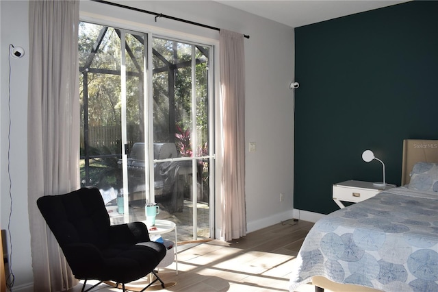 bedroom with light wood-type flooring