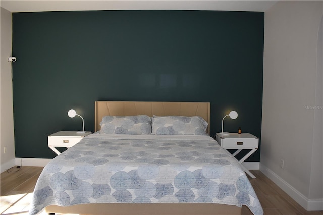 bedroom featuring light hardwood / wood-style floors