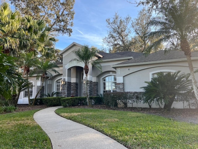 view of front facade with a front lawn